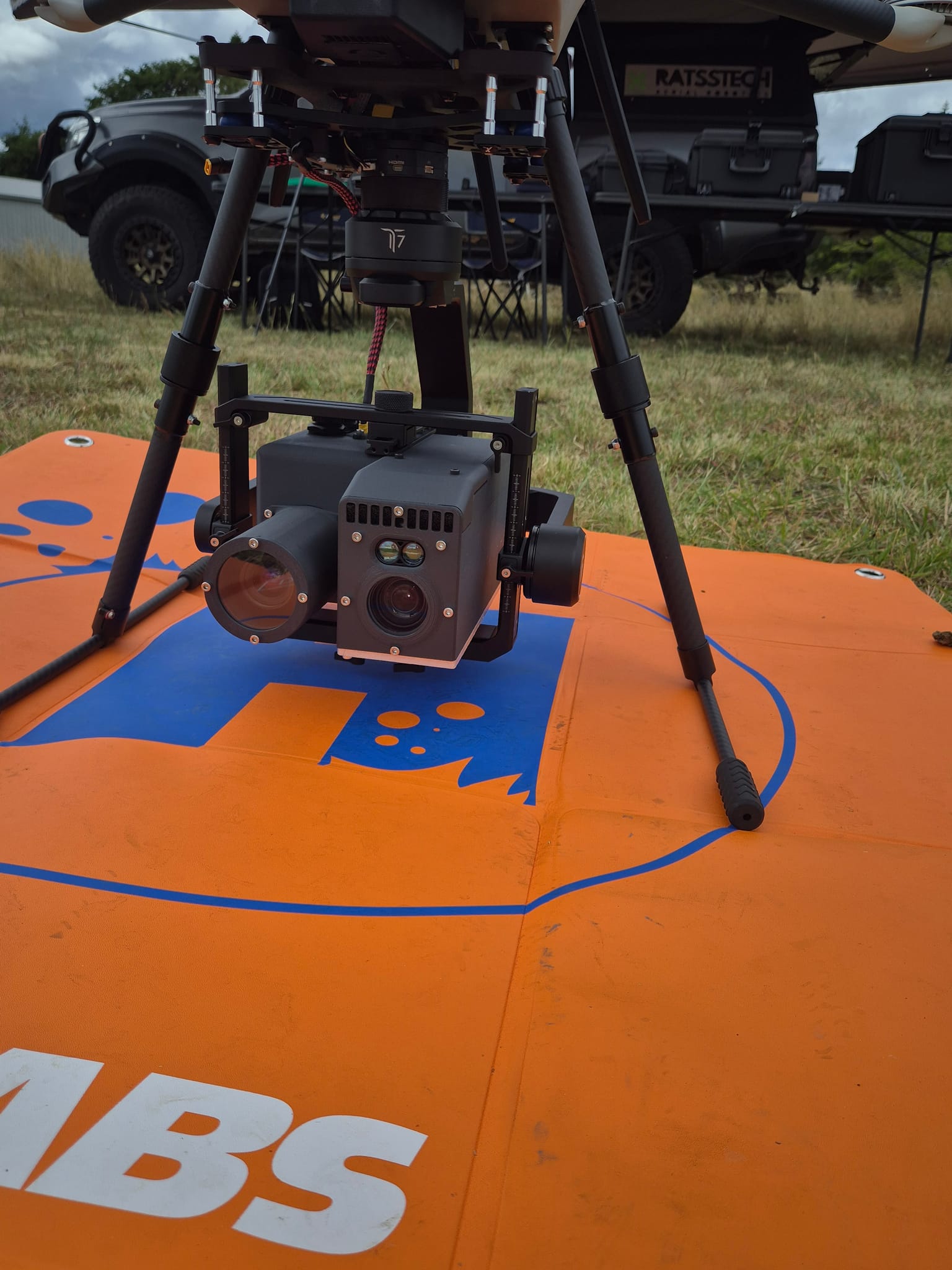 Custom dual-camera gimbal payload mounted under a multirotor drone